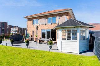 Einfamilienhaus kaufen in 23730 Neustadt, KP Reduzierung - Neuwertiges Einfamilienhaus mit Dachterrasse und gepflegtem Garten.