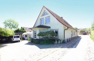 Anlageobjekt in 18574 Garz, Einziehen und entspannen: Einfamilienhaus mit Ferienwohnung, Gewerbefläche und gepflegtem Garten