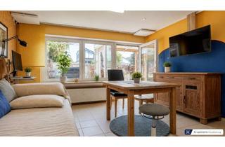 Wohnung kaufen in 63165 Mühlheim, Ein Zuhause zum Wohlfühlen: Helle Wohnung mit eigenem Garten und zwei Stellplätzen