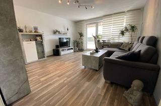 Wohnung kaufen in 26725 Borssum/Hilmarsum, Großzügige 3-Zimmer-Wohnung mit Balkon und Stellplatz
