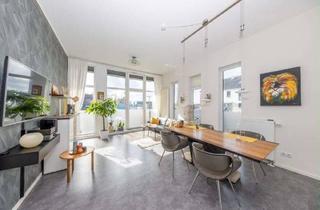 Wohnung kaufen in 50354 Hürth, Neuwertige 4-Zimmer-Erdgeschosswohnung mit 24 m² Südbalkon, gehobener Ausstattung und XXL-Deckenhöhe