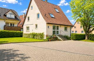 Haus kaufen in 71292 Friolzheim, Attraktives, teilweise vermietetes Dreifamilienhaus mit vier Garagen in guter zentaler Wohnlage