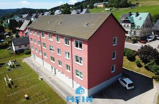 Wohnung kaufen in 08340 Schwarzenberg, Solide Mieteinnahmen sichern: Helle Eigentumswohnung mit Stellplatz und Tageslichtbad