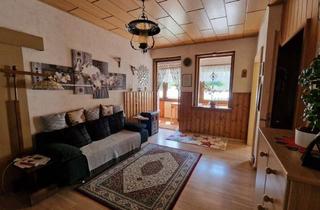 Wohnung kaufen in 09456 Annaberg-Buchholz, 128 m² Wohntraum mit 700 m² Privatgarten, Wintergarten und 3 Stellplätzen – Wohnen wie im eigenen Ha
