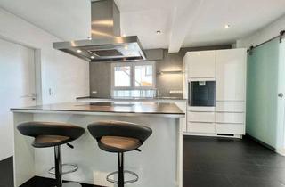 Wohnung kaufen in 64354 Reinheim, Tolles Wohnambiente mit Designküche, Kaminofen und großer Terrasse!