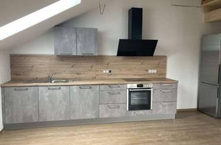 Wohnung mieten in 85653 Aying, Geschmackvolle Dachgeschosswohnung mit drei Zimmern sowie Balkon und Einbauküche in Aying