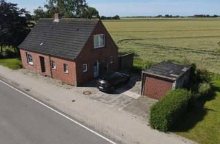 Einfamilienhaus kaufen in 26831 Bunde, Großzügiges Grundstück mit Einfamilienhaus und Blick ins Grüne - Provisionsfrei!