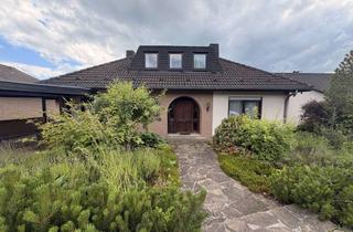 Einfamilienhaus kaufen in 34270 Schauenburg, Stilvoll wohnen mit Aussicht: Einfamilienhaus mit Einliegerwohnung in Elgershausen!