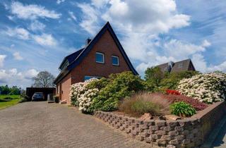 Haus kaufen in 47551 Bedburg-Hau, Bedburg-Hau: Zwei Einheiten, viele Möglichkeiten – attraktives Doppelhaus mit Potenzial
