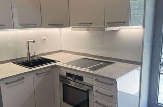 Wohnung kaufen in 52249 Eschweiler, Exklusive Erdgeschosswohnung in einer hochwertig modernisierten ehemaligen Mühle – komplett möbliert