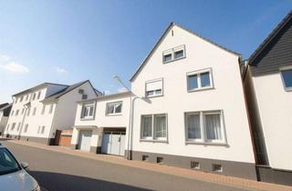 Mehrfamilienhaus kaufen in 64319 Pfungstadt, Vielseitiges Mehrfamilienhaus mit vier Wohneinheiten, großem Garten und Entwicklungspotenzial