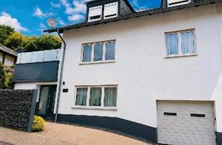 Einfamilienhaus kaufen in 54518 Osann-Monzel, Osann-Monzel - Charmante Doppelhaushälfte mit großer Terrasse, Balkon und Garage