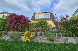 Einfamilienhaus kaufen in 97950 Großrinderfeld, Großrinderfeld - Einfamilienhaus mit Einliegerwohnung, Doppelgarage, Traumgarten