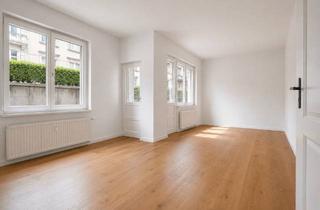 Wohnung kaufen in 12045 Neukölln, Stilvolle 2-Zimmer-Wohnung mit Balkon und klassischem Dielencharme