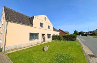 Wohnung kaufen in 26969 Butjadingen, Attraktive Kapitalanlage an der Nordsee – Erdgeschosswohnung mit Garten