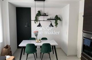 Wohnung kaufen in 63801 Kleinostheim, Modernisierte 3-Zimmer Wohnung mit Terrasse & Stellplatz