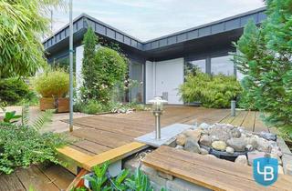 Haus kaufen in 23795 Groß Rönnau, Bungalow-Charme – Wohnen auf einer Ebene mit Vollkeller