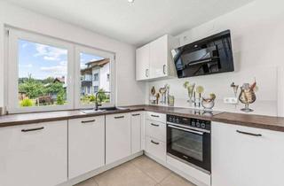 Haus kaufen in 79802 Dettighofen, Teilmodernisiertes Zweifamilienhaus mit Terrasse, Garten, Doppelgarage und Ausbaupotenzial