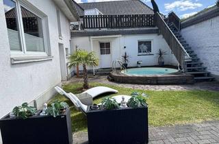 Einfamilienhaus kaufen in 46354 Südlohn, Südlohn: Viel Platz für Familie, Hobby & Autos – Haus mit Halle