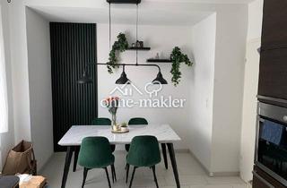 Wohnung kaufen in 63801 Kleinostheim, Modernisierte 3-Zimmer Wohnung mit Terrasse & Stellplatz