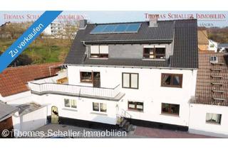 Haus kaufen in 63694 Limeshain, Zweifamilienhaus mit Nebengebäude, 2 Garagen und modernisierter Ausstattung