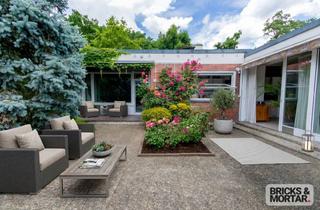 Doppelhaushälfte kaufen in 63263 Neu-Isenburg, +++ Großzügige Doppelhaushälfte im Bungalowstil mit großem Garten und Blick ins Grüne +++