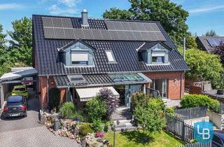 Haus kaufen in 24211 Rastorfer Passau, Modernes Wohnglück: Hochwertiges Zweifamilienhaus mit traumhafter Garten-Oase in Rastorfer Passau