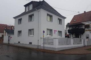 Einfamilienhaus kaufen in 55239 Gau-Odernheim, Gau-Odernheim - Familienhaus mit Praxisfläche