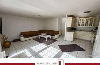 Wohnung kaufen in 52531 Übach-Palenberg, Wohnen mit Garten: 3-Zimmer-Erdgeschosswohnung mit Terrasse und Garage