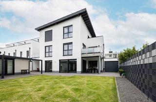 Wohnung kaufen in 41515 Grevenbroich, Exklusives Wohnen auf einer Ebene – Neubau-Eigentumswohnung mit Garten und Wellnessbereich