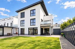 Wohnung kaufen in 41515 Grevenbroich, Exklusives Wohnen auf einer Ebene – Neubau-Eigentumswohnung mit Garten und Wellnessbereich