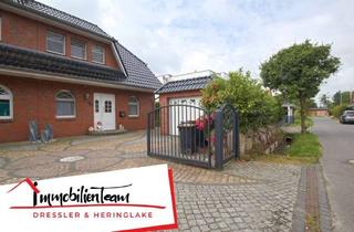 Doppelhaushälfte kaufen in 25469 Halstenbek, Feldrandlage von Halstenbek: Komfortable Doppelhaushälfte mit Garten, Garage und Ausbaupotenzial