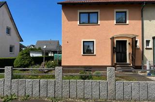 Doppelhaushälfte kaufen in 78647 Trossingen, Gemütliche Doppelhaushälfte mit Kamin, Garten und modernisiertem Erdgeschoss