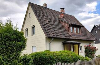 Einfamilienhaus kaufen in 37619 Bodenwerder, Gemütliches Einfamilienhaus mit Kamin, sonniger Terrasse und großem Garten in Bodenwerder
