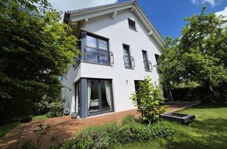Einfamilienhaus kaufen in 82178 Puchheim, Ankommen in Puchheim-Ort: Großzügiges Einfamilienhaus mit Garten, Kamin und moderner Energietechnik