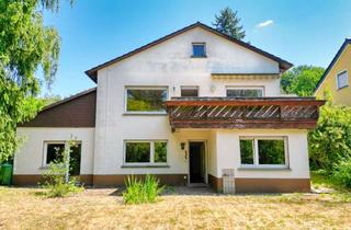 Einfamilienhaus kaufen in 61273 Wehrheim, Einfamilienhaus in der Saalburgsiedlung mit Einliegerwohnung