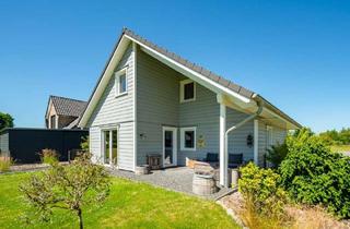 Einfamilienhaus kaufen in 25878 Drage, Optisch und energetisch eindrucksvoll: modernes Einfamilienhaus mitten in der Ferienregion.