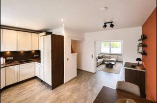 Wohnung kaufen in 66663 Merzig, Modernisierte Erdgeschosswohnung mit Terrasse und Kamin in Merzig-Hilbringen