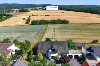 Haus kaufen in 61250 Usingen, Liebhaberimmobilie in begehrter Feldrandlage mit unverbaubarem Blick, schönem Garten und viel Charme