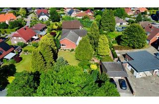 Einfamilienhaus kaufen in 26316 Varel, Parkähnliches Grundstück trifft lichtdurchflutetes Wohnen – Einfamilienhaus in Obenstrohe