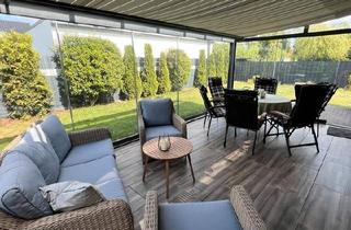 Haus kaufen in 28879 Grasberg, Grasberg - Neuwertiger Bungalow mit Wintergarten in Grasberg zu verkaufen