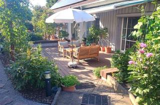 Wohnung kaufen in 41334 Nettetal, Große Eigentumswohnung im Bungalowstil mit Wintergarten, Garten, Terrasse und Stellplatz
