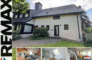 Wohnung kaufen in 46459 Rees, Moderne Eigentumswohnung über zwei Etagen mit zwei Balkonen und Garten in Rees