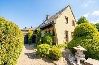 Einfamilienhaus kaufen in 41363 Jüchen, Freistehendes Einfamilienhaus mit großem Garten und Baugrundstück