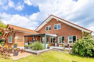 Haus kaufen in 26607 Aurich, Großzügiges Zweifamilienhaus mit vielseitigen Nutzungsmöglichkeiten, hochwertiger Ausstattung und...