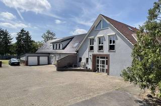 Mehrfamilienhaus kaufen in 32369 Rahden, Mehrfamilienhaus mit PV, 4 Wohnungen, 7 Garagen, 1 Werkstatt und 4.000 Grundstück in Rahden-Wehe