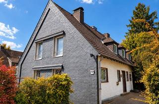 Doppelhaushälfte kaufen in 40822 Mettmann, Modernisierte Doppelhaushälfte mit großem Garten und Garage in familienfreundlicher Lage