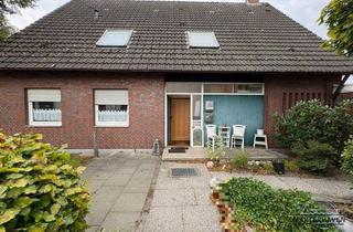 Haus kaufen in 26340 Zetel, Zweifamilienhaus mit Garten und Garage in Zetel zu verkaufen.