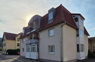 Wohnung kaufen in 98617 Meiningen, Vermietete 2-Zimmer-Dachgeschosswohnung mit Balkon und 2 Stellplätzen