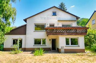Einfamilienhaus kaufen in 61273 Wehrheim, Einfamilienhaus in der Saalburgsiedlung mit Einliegerwohnung